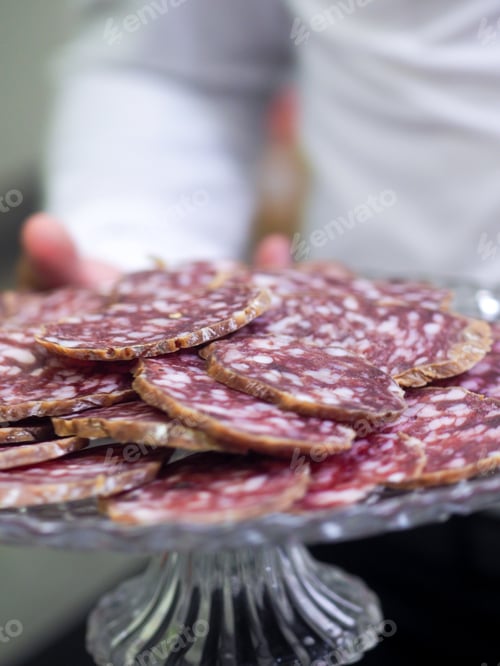 Preview: sliced curated italian salami raw pork meat delicatessen on glass stand