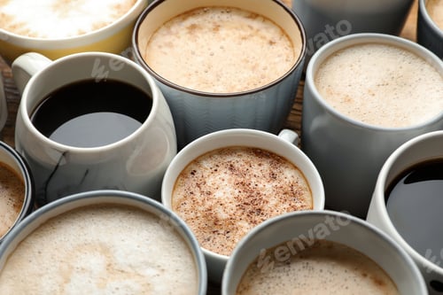 Preview: Many cups of different coffees on table, closeup