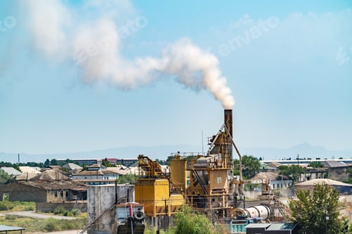 Preview: Smoke from the chimney of a small factory environmental pollution