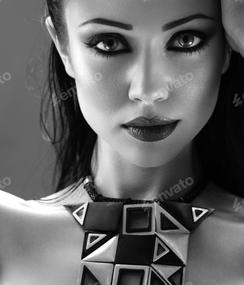 Preview: Studio shots of an attractive young dark haired woman