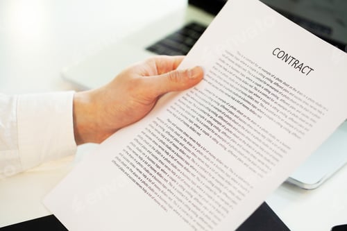 Preview: Closeup person signs a contract on cooperation