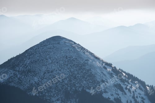 Preview: Mountain top in snow