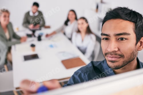 Preview: Building the business of my dreams. Shot of a businessman making notes during a business meeting.