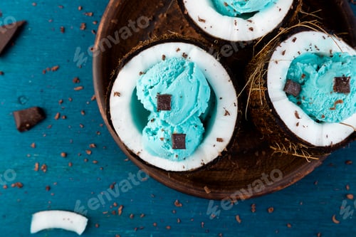 Preview: Blue ice cream in coconut bowl.