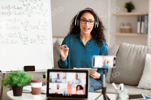Preview: Young teacher giving virtual lecture to diverse students