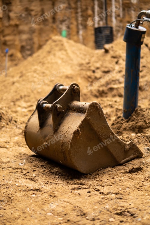 Preview: Detail of digging bucket on gravel on construction site