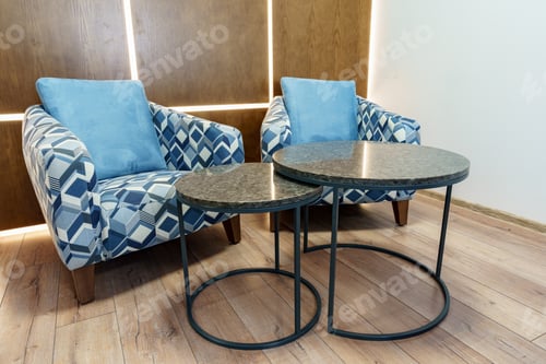 Preview: Office waiting area with arm chairs and coffee table