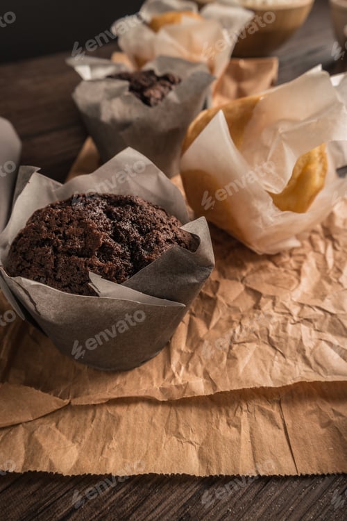 Preview: Delicious muffins on a rustic background