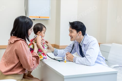 Preview: Doctor taking cake of Child patient in hospital.