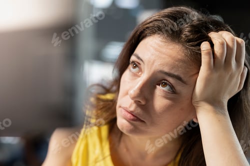 Preview: Pensive programmer thinking how to design and develop software application