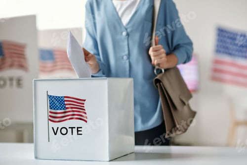 Preview: Young female citizen of United States of America putting paper into ballot box