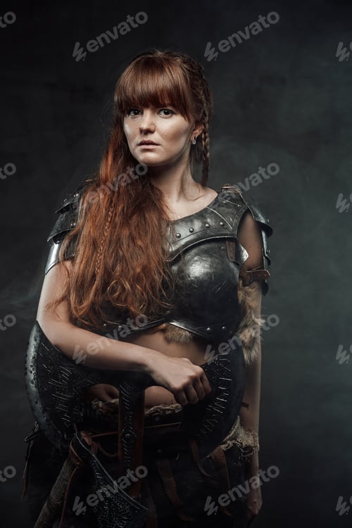 Preview: Fashion of nordic amazon with two handed axe in foggy background
