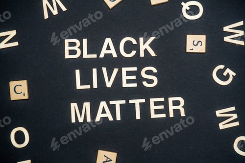 Preview: BLACK LIVES MATTER word written on dark paper background. BLACK LIVES MATTER text for your concepts