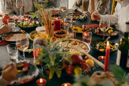 Preview: Cozy holiday table setting with different delicious food and beverages ready for friends home party