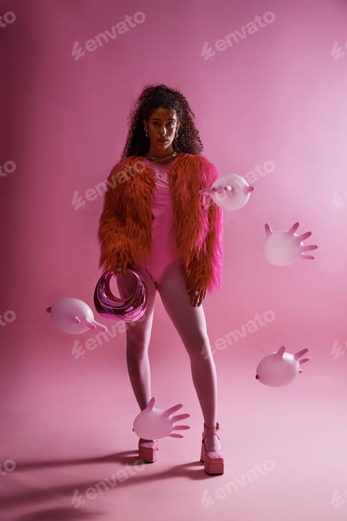 Preview: Young Woman Posing Confidently during Fashion Photoshoot