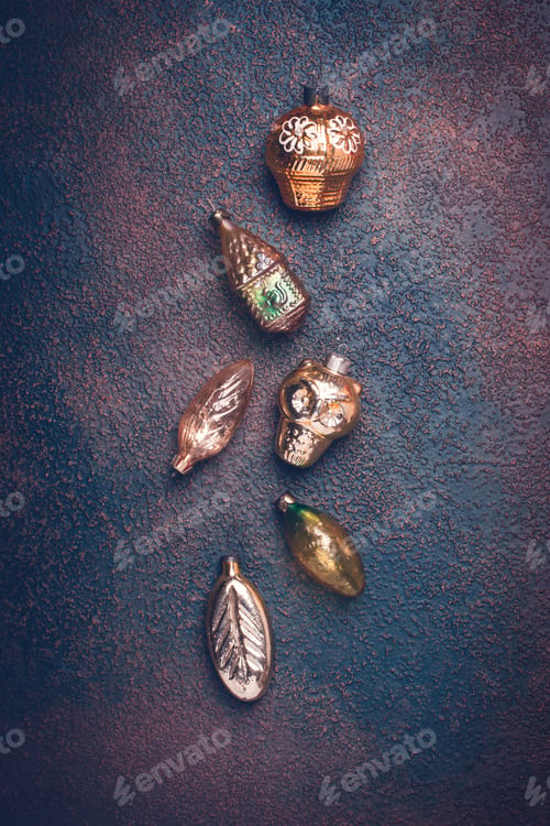 Preview: Christmas vintage gold toys on brown background
