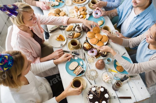 Celebration with Friends Enjoying Treats at a Party