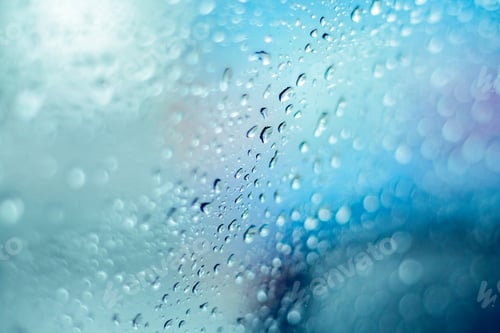 Preview: Rain droplets at glass window