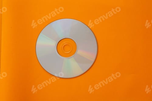 Preview: Compact disc isolated against orange background
