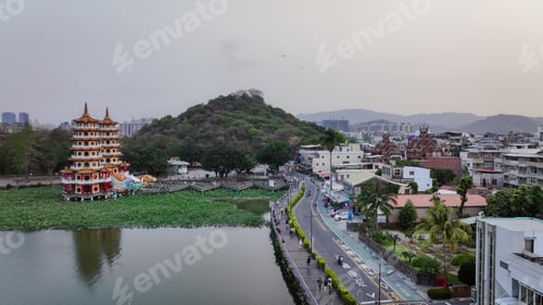 Preview: Exploring Kaohsiung Taiwan with a view of unique architecture and lush greenery at sunset