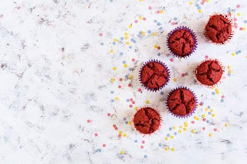 Preview: Chocolate muffins "red velvet" on white background