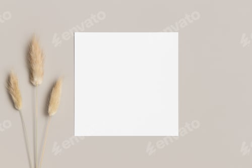 Preview: Square invitation card mockup with a lagurus on a beige table.