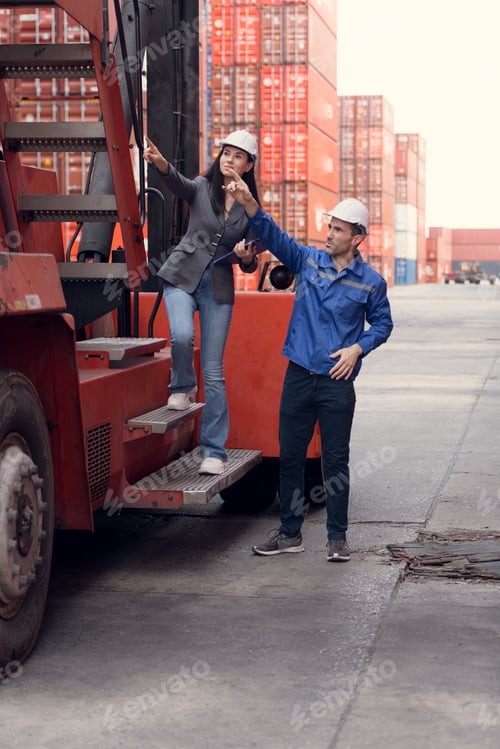 Preview: Container manufacturing manager and businesswomen survey the area to plan the storage