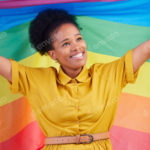 Preview: Gay, flag and happy black woman in studio for pride, rights and lgbtq lifestyle choice. Rainbow, fr