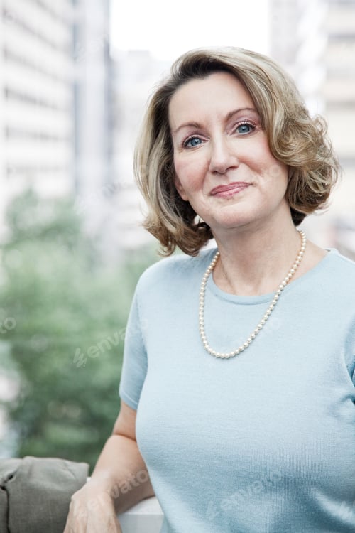 Preview: Portrait of a caucasian businesswoman in a convention center space.