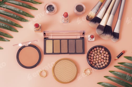 Preview: A set of female cosmetics on a pink background.