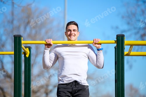 Preview: young boy exercising in a park