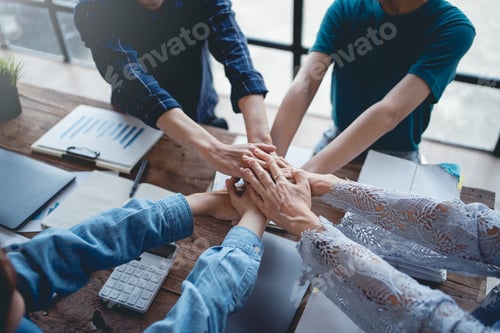 Preview: Young entrepreneurs work as a team meeting and work together on a new project that emphasizes unity