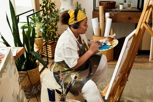 Preview: Crafting creativity in a vibrant workshop with a talented artist immersed in her craft