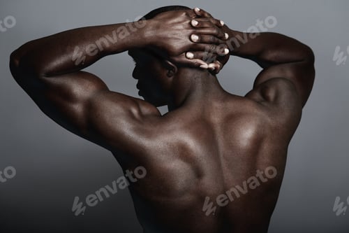 Preview: Solid as a rock. A handsome and muscular young man posing in the studio.