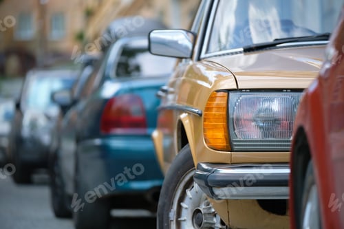 Preview: City traffic with cars parked in line on street side
