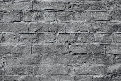 Preview: Rough gray painted brick wall for vintage architecture and design texture concept