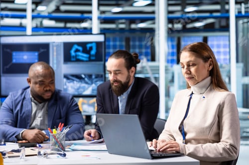 Preview: Manufacturing plant executives meeting to analyze production data