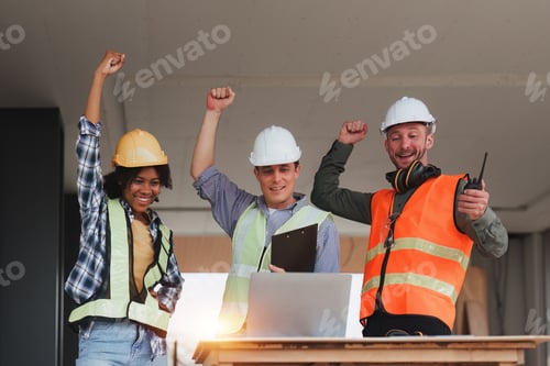 Preview: Engineer and Architecture and Foreman celebrate success at construction site. Industrial people and