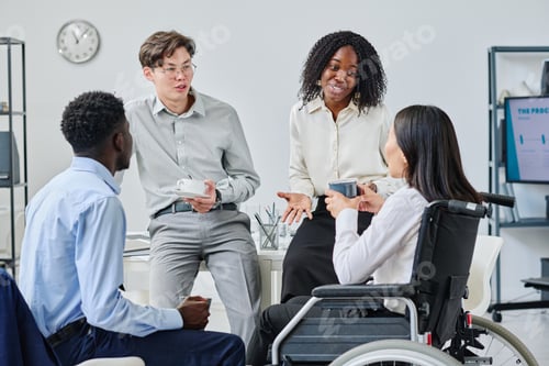 Preview: Business people talking during coffee break