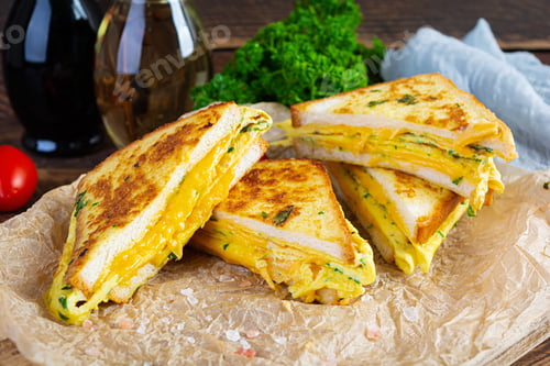 Preview: Roasted French toast with ham, egg, herbs and cheese cheddar. Delicious grilled breakfast sandwich