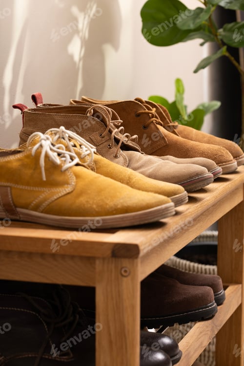 Preview: Stylish interior of modern hallway with shoes on a stand, a girl shoes, measuring shoes