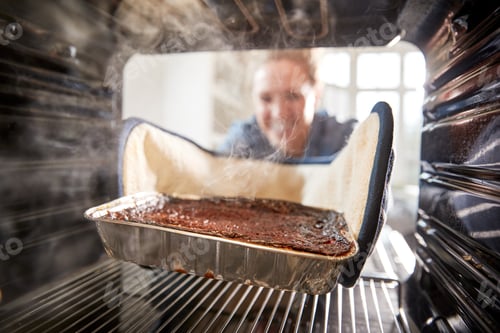 Preview: View Looking Out From Inside Oven As Woman Burns Dinner