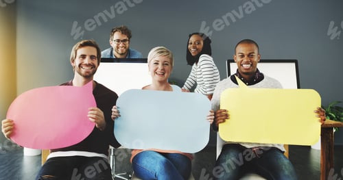 Preview: Shot of a diverse group of people holding up speech bubbles in a modern office