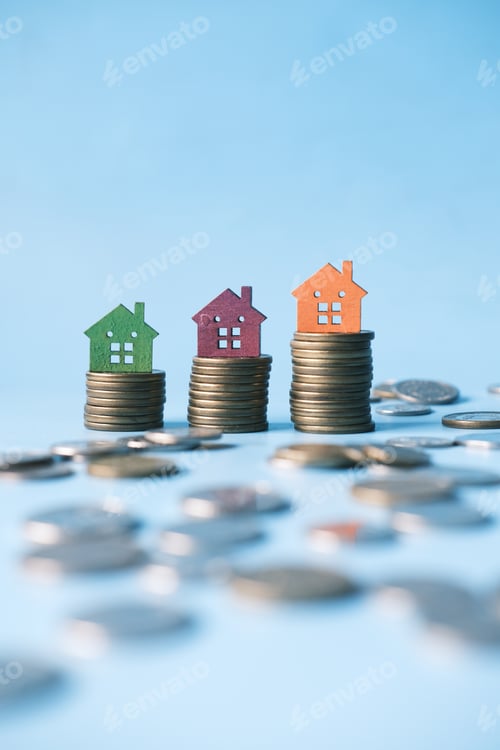 Preview: stack of coins and house on table , the concept of house finance