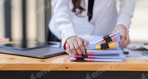 Preview: Business Documents, Auditor businesswoman checking searching document legal prepare paperwork or