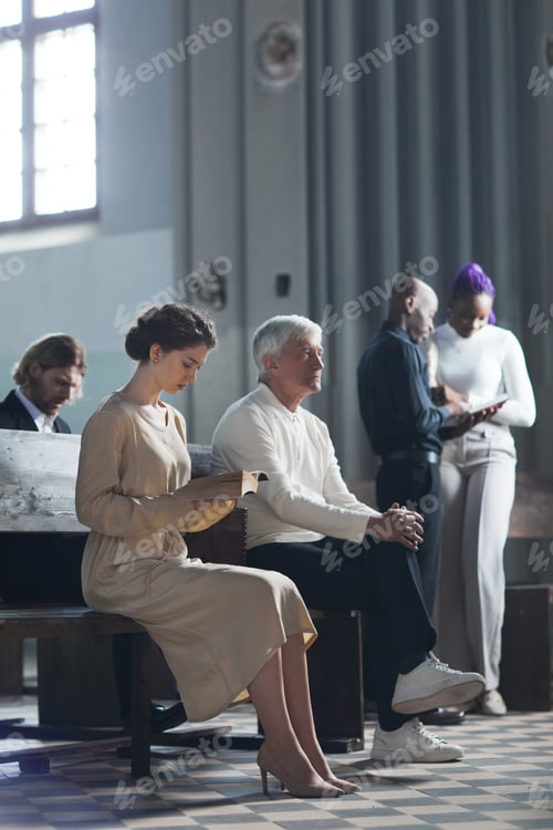 Preview: People listening to mass in the church