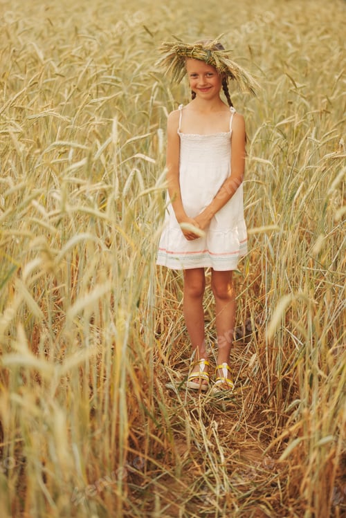 Preview: young girl in the yellow field