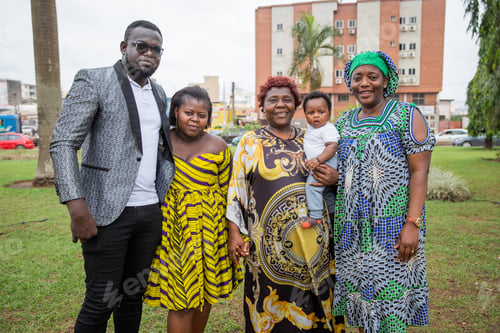 Preview: group photo of a multigerational African family, grandmother, parents, son and aunt together