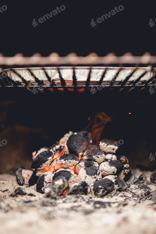 Preview: Barbecue charcoal burning on fire.