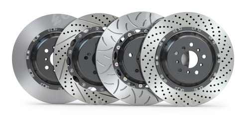 Preview: Different types of brake disks. Drilled and slotted brake disks in a row.